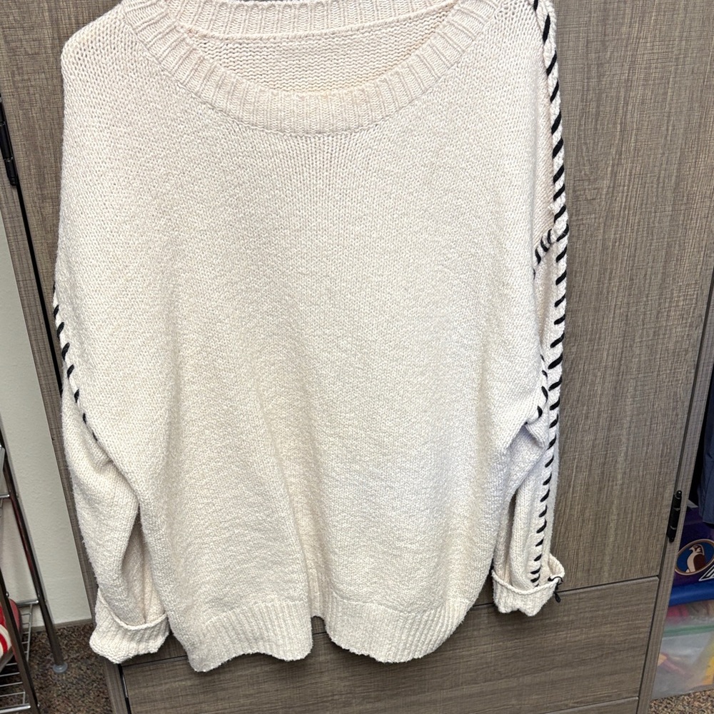 Cozy Cream Sweater with Striped Accents